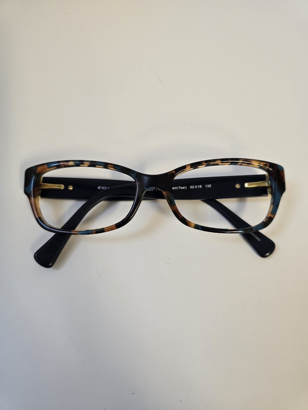 Coach Eyeglasses (Frame Only). HC6078 - 5337 Teal Confetti Tortoise. 52-16